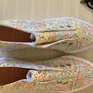 Flowered slip on shoes